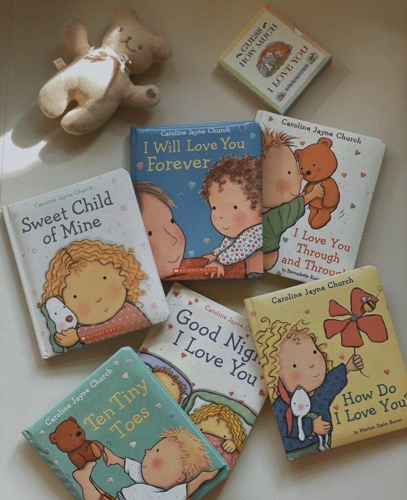 Collection of hardcover board books by Caroline Jayne Church, including Sweet Child of Mine and I Will Love You Forever.